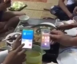 Clip: Thách nhau thả 2 chiếc điện thoại vào ca trà đá để "thử độ phủ sóng"