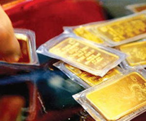 Vàng giảm nhẹ, tỷ giá USD thay đổi chóng mặt