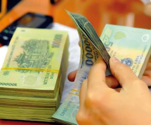 Dự báo tiền thưởng Tết trung bình là 5 triệu đồng/người