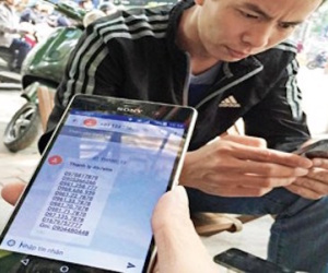 Bùng nổ tin nhắn rác, tiền vào túi ai?