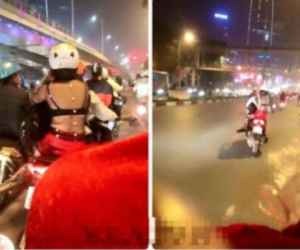 Thiếu nữ diện áo trong suốt lộ nội y giữa trời rét trên phố Hà Nội