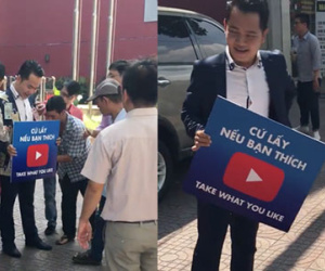 Nam thanh niên cho dân giật tiền giữa phố Sài Gòn