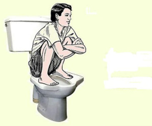 Đàn ông tiểu ngồi dễ bị liệt dương