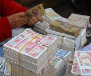 “Giá” tiền lẻ, tiền mới càng sát Tết càng cao