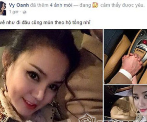 Vy Oanh tình tứ nắm tay, tựa vai người đàn ông giấu mặt