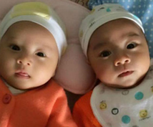 Cặp chị em sinh đôi Hà Nội đẻ con cùng ngày