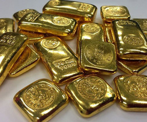 Giá vàng giảm khi FED có khả năng nâng lãi suất