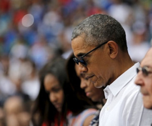Xem bóng chày sau vụ đánh bom Bỉ, Obama khiến khủng bố chưng hửng