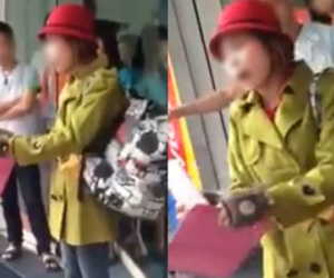 Hà Nội: "Hot girl quỵt tiền" bị người dân mắng chửi, đánh đập trên phố Huế