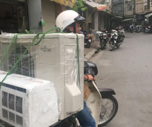 Hà Nội vào hè: Thợ tân trang máy lạnh kiếm 20 triệu đồng/tháng