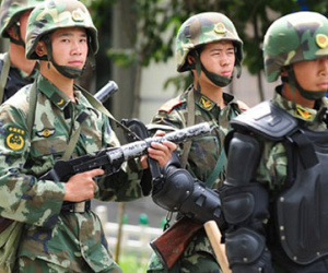 Thẩm phán Tân Cương bị giới chức Trung Quốc “sờ gáy“