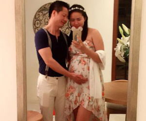 Chồng đại gia tình cảm đỡ bụng bầu cho Phan Như Thảo