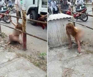 Cô gái khỏa thân đi lại trên đường phố Hà Nội đã được đưa vào trại tâm thần