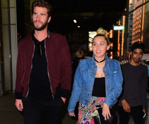 Miley Cyrus và Liam Hemsworth tay trong tay sau tin sắp cưới