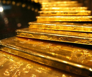 Giá vàng tiến sát mốc 1.300 USD khi Fed chưa tăng lãi suất