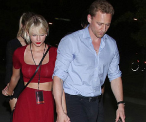Taylor Swift và bạn trai mới không ngừng âu yếm khi đi xem ca nhạc