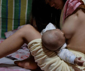 Bức ảnh người mẹ không tay vẫn oằn mình cho con bú lay động hàng triệu trái tim