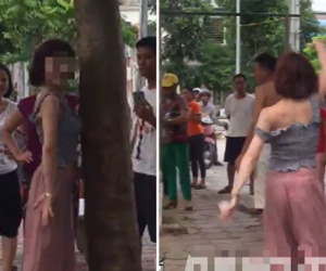 Hà Nội: Cô gái trẻ nghi ngáo đá dựng xe SH bên đường rồi nhảy múa điên loạn