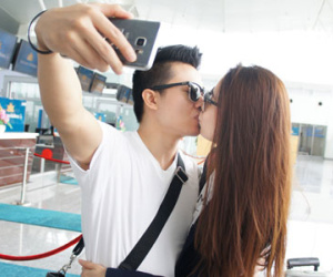 Chồng Dương Thùy Linh không ngại hôn vợ giữa sân bay
