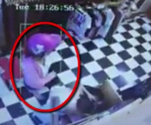 Clip: "Nữ quái" vờ mua hàng rồi trộm đồ nhét vào người