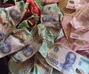 Hưng Yên: Đi toi 30 triệu đồng vì nhờ con gái sấy tiền cho khô