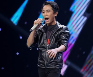 Cậu bé hát hội chợ kiếm tiền tỏa sáng tại The Voice Kids