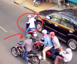 Nhóm côn đồ táo tợn chặn xe đánh cướp giữa đường phố Sài Gòn