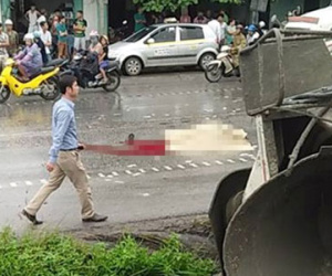 Ôtô húc văng người đàn ông băng qua quốc lộ