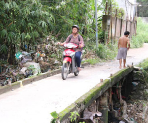 Mưa lớn ở Biên Hòa, một thanh niên bị cuốn trôi cùng xe máy
