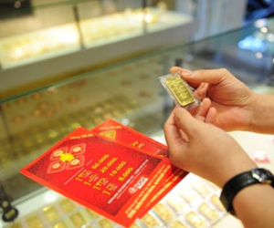 Giá vàng bật tăng sau phiên rung lắc dữ dội