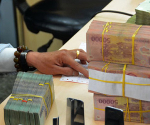 Các ngân hàng đang "ăn chênh lệch" lãi suất bao nhiêu?