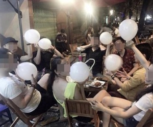 Sự thật vụ hotgirl Hà Nội bị liệt vì hít bóng cười