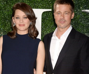 Brad Pitt thân mật với người tình tin đồn trên thảm đỏ