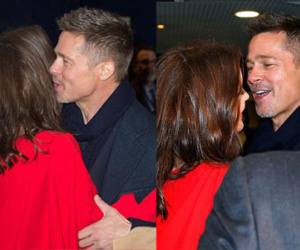 Brad Pitt ôm Marion Cotillard trong buổi công chiếu phim ở Paris