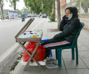 Chùm ảnh: Người Hà Nội co ro trong cái lạnh cuối tháng 11