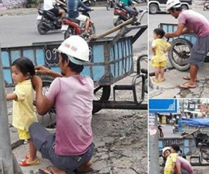 Bức ảnh người bố công nhân buộc tóc cho con gái khiến cư dân mạng “tan chảy”
