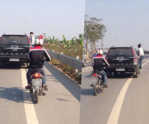 Chàng trai đu bám trên xe ô tô gần 10km đường khiến nhiều người sửng sốt