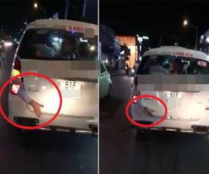 Hình ảnh rùng rợn: Cánh tay bị kẹp ở cốp xe taxi chạy trên phố Sài Gòn