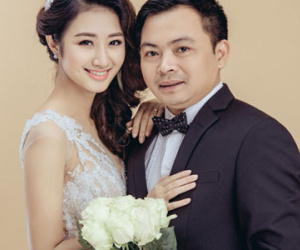 Hoa hậu Thu Ngân nép vào chồng đại gia trong ảnh cưới