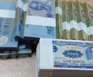 Dịch vụ đổi tiền lẻ “nóng” trước Tết Đinh Dậu: Phí lên tới 40%