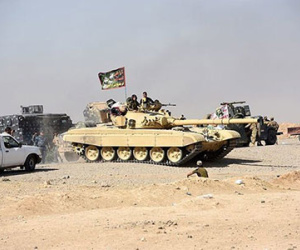 Phiến quân IS ở Iraq lái xe tăng tìm đường thoát sang Syria