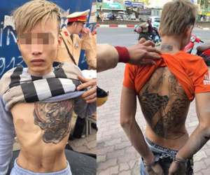Cặp đôi tuổi teen xăm hình rồng vứt xe máy khi thấy cảnh sát