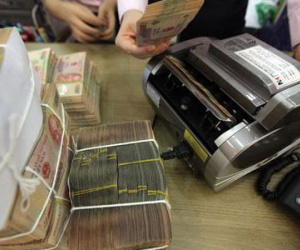 Đằng sau vẻ hào nhoáng thu nhập cao của lương ngân hàng