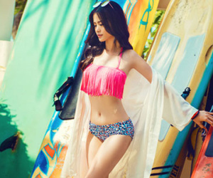 Đông Nhi khiến fan "choáng" vì mặc áo tắm quay MV