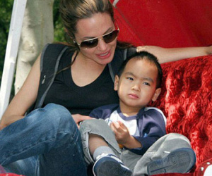 Hành trình 15 năm làm con nuôi Jolie của bé Maddox