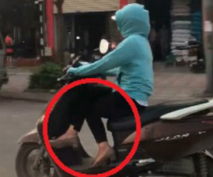 Vừa lái xe vừa bắt chéo chân, "ninja xe tay ga" khiến người đi đường hãi hùng dạt xa tám thước