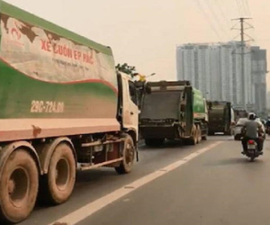4 xe chở rác rồng rắn chạy trên làn xe buýt nhanh