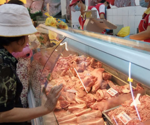 Hoang mang với thịt lợn nhập khẩu giá 27.000 đồng một kg