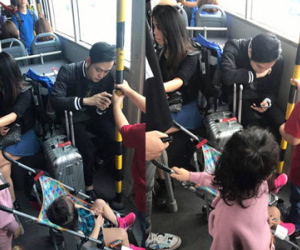 Mặc trẻ em đứng ngay trước mặt, Quang Vinh gây tranh cãi khi vẫn thản nhiên ngồi ghế