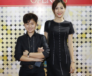Chị gái Nam Em sánh đôi người tình đồng tính đi event